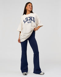 Woman wearing Varsity EST Heavyweight Oversized Tee  - Off White-Future Navy | Model:Bianca | Size:L | Thumbnail Index: 8
