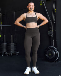 Woman wearing Fusion Ultra High-Rise Full Length Legging Pockets - Onyx | Model:Terai | Size:M | Thumbnail Index: 1