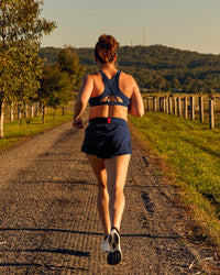 Woman wearing Tia-Clair Toomey-Orr Accelerate 3" Storage Running Short - Future Navy | Model:Tia | Size:M | Thumbnail Index: 4
