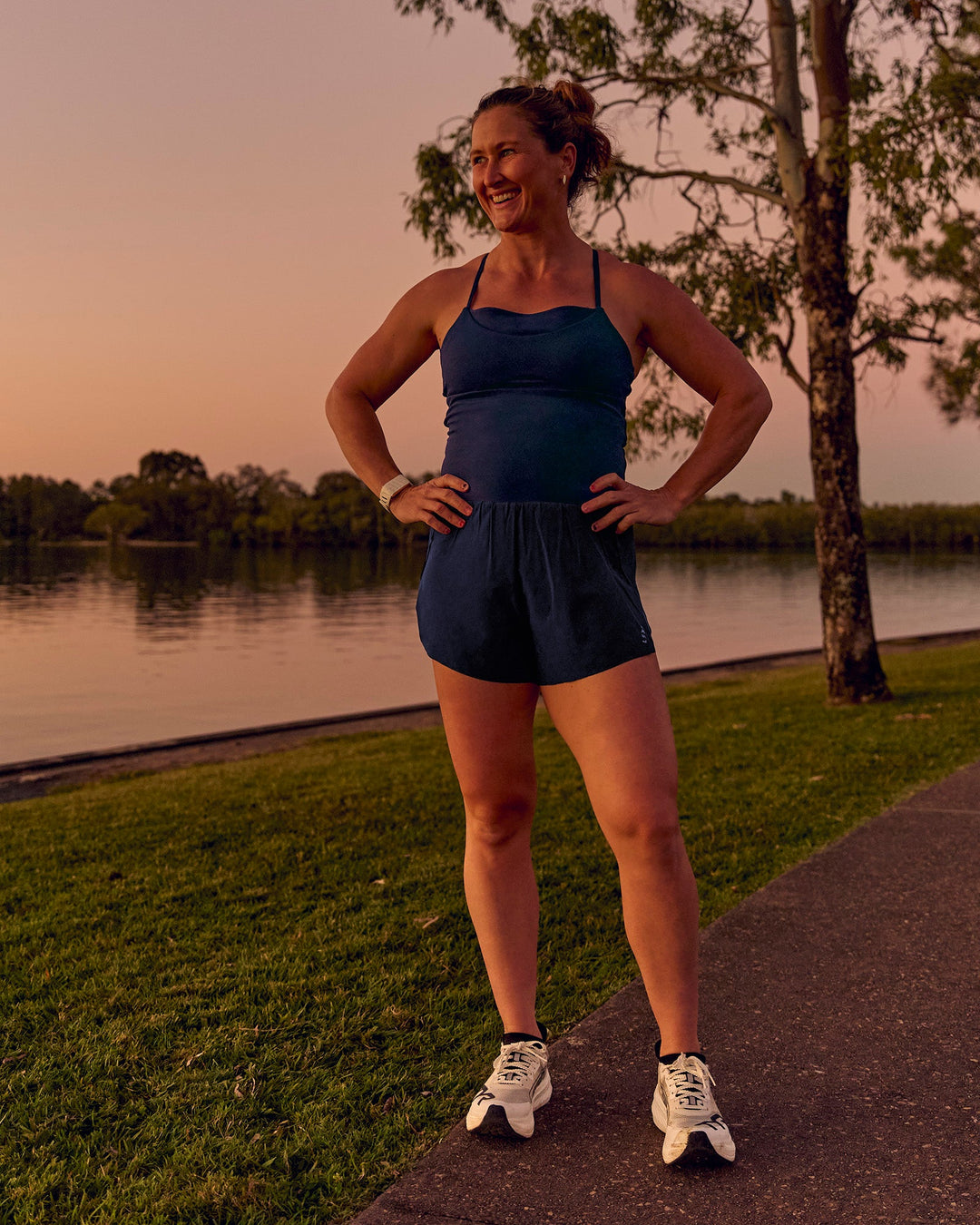 Woman wearing Tia-Clair Toomey-Orr Legacy 3" Run One-Piece - Future Navy | Model:Tia | Size:M - view 2