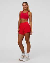 Woman wearing Challenger 3" Lined Performance Short - Scarlet | Model:Amity | Size:S