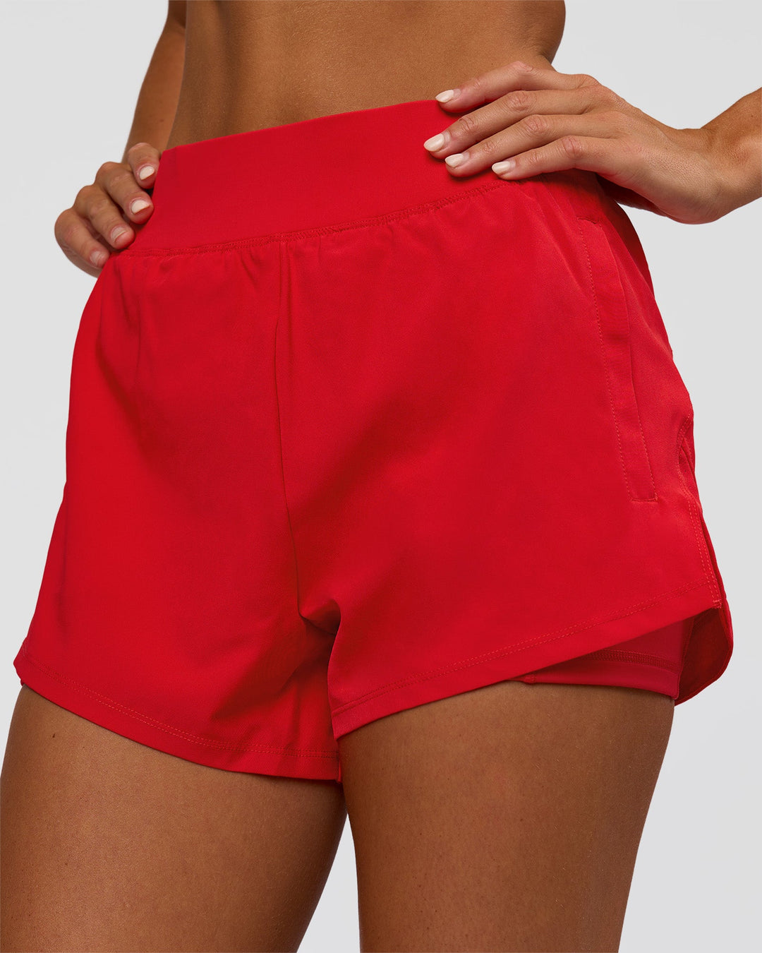 Woman wearing Challenger 3" Lined Performance Short - Scarlet | Model:Amity | Size:S
