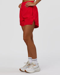 Woman wearing Challenger 5" Lined Performance Short - Scarlet | Model:Amity | Size:S | Thumbnail Index: 5