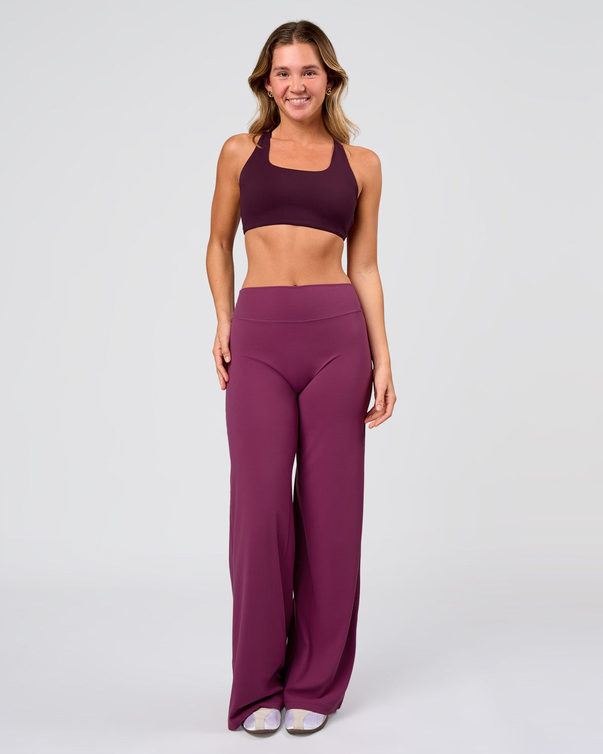 Woman wearing Elixir High-Rise Pant - Boysenberry | Model:Amity | Size:S