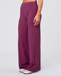 Woman wearing Elixir High-Rise Pant - Boysenberry | Model:Amity | Size:S | Thumbnail Index: 0