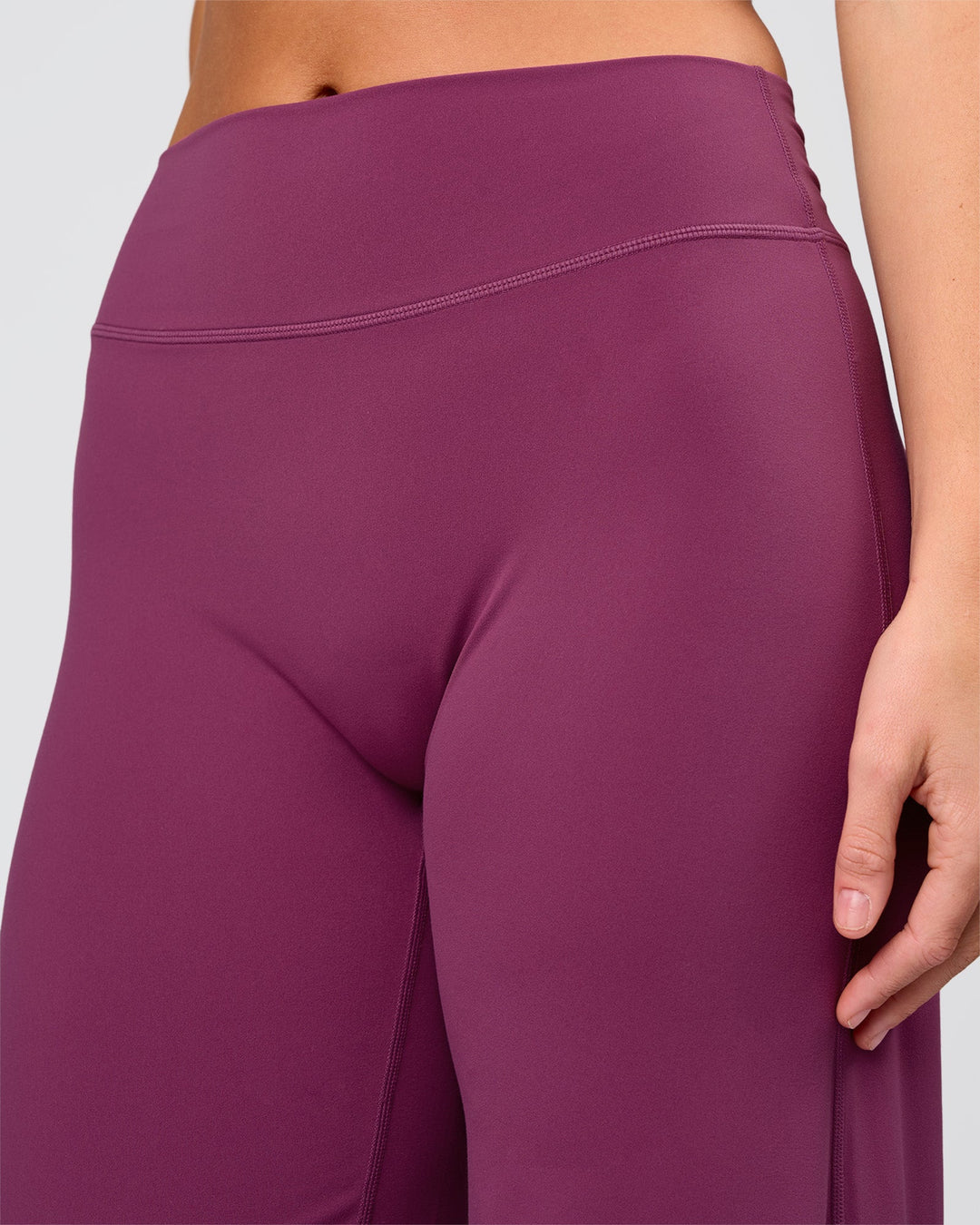 Woman wearing Elixir High-Rise Pant - Boysenberry | Model:Amity | Size:S - view 4