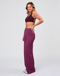 Woman wearing Elixir High-Rise Pant - Boysenberry | Model:Amity | Size:S | Thumbnail Index: 6