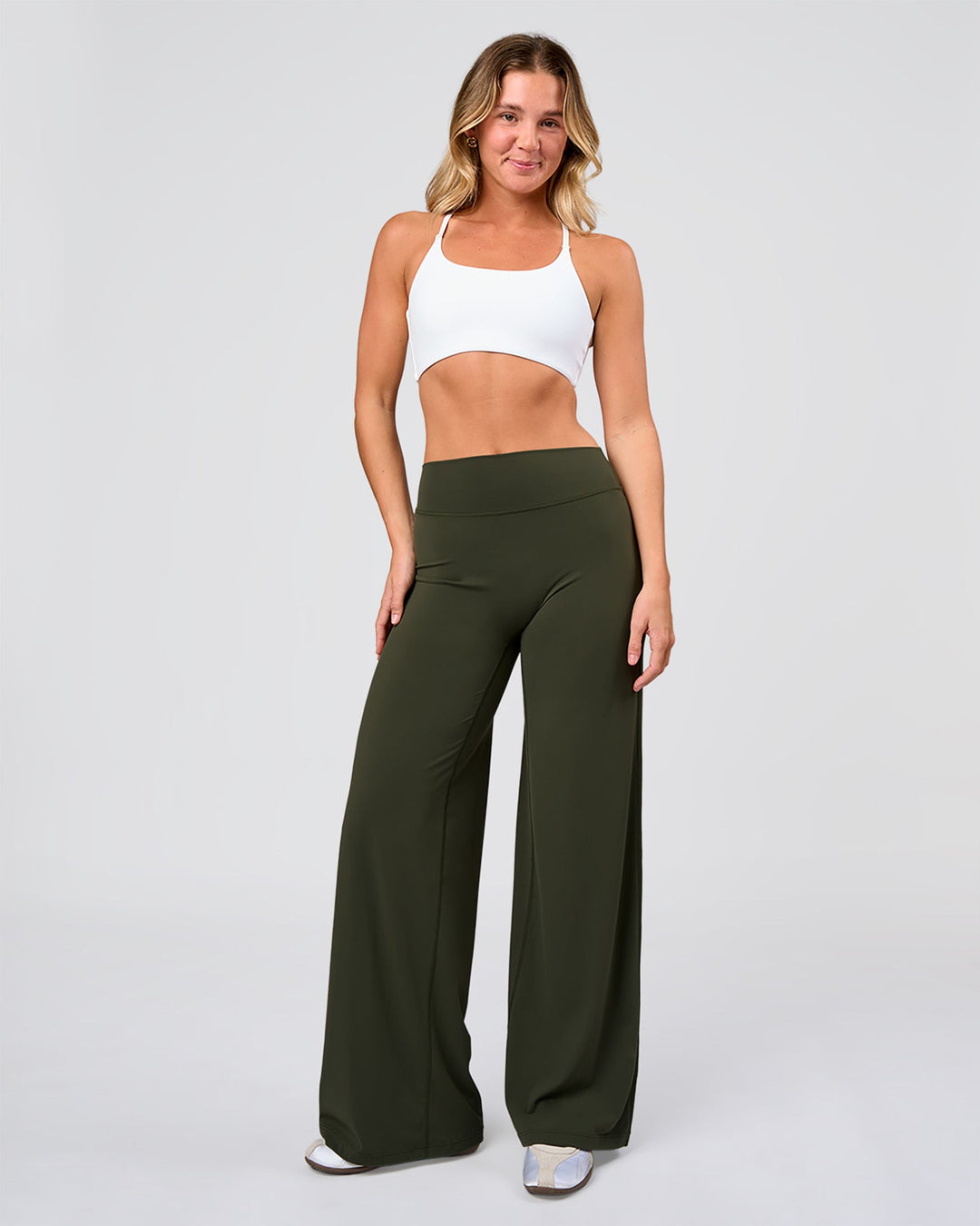 Woman wearing Elixir High-Rise Pant - Pure Olive | Model:Amity | Size:S - view 2