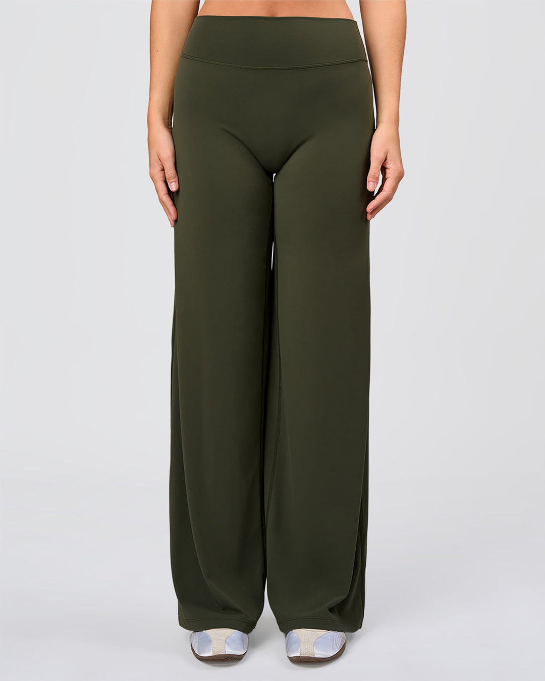 Woman wearing Elixir High-Rise Pant - Pure Olive | Model:Amity | Size:S - view 1