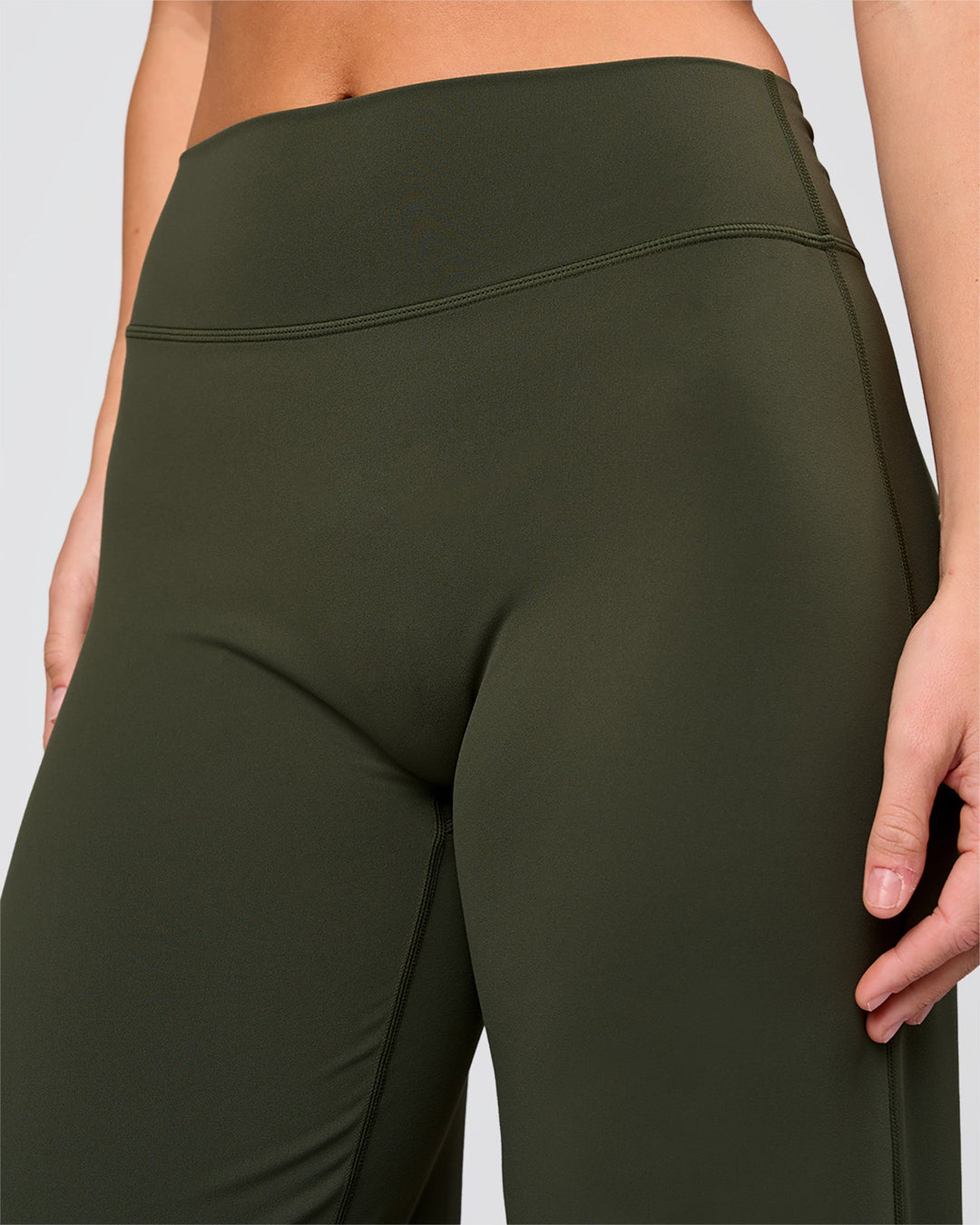 Woman wearing Elixir High-Rise Pant - Pure Olive | Model:Amity | Size:S - view 7