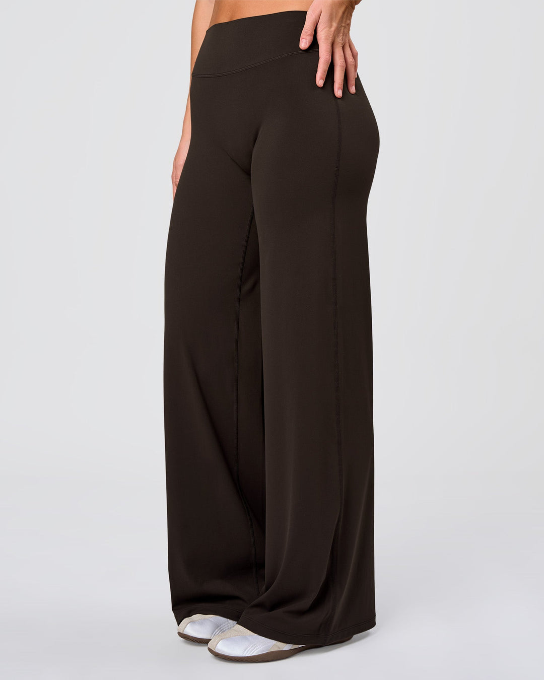 Woman wearing Elixir High-Rise Pant - Ground Coffee | Model:Amity | Size:S - view 1
