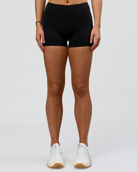 Woman wearing RXD Mid-Rise 4" Short - Black | Model:Amity | Size:S | Thumbnail Index: 5