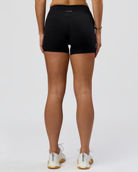 Woman wearing RXD Mid-Rise 4" Short - Black | Model:Amity | Size:S | Thumbnail Index: 6