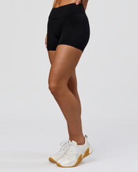 Woman wearing RXD Mid-Rise 4" Short - Black | Model:Amity | Size:S | Thumbnail Index: 3