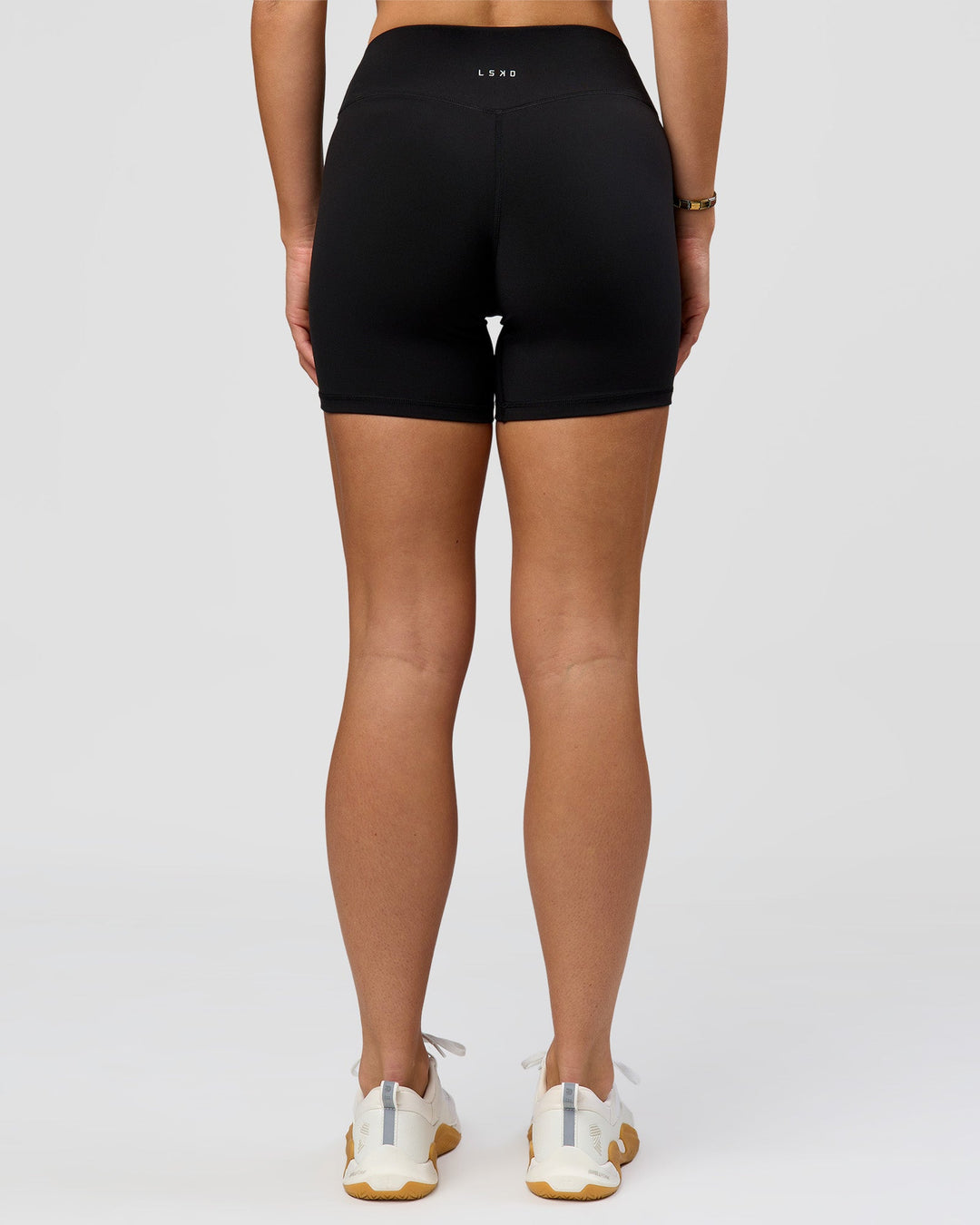 Woman wearing RXD Mid-Rise 6" Short - Black | Model:Amity | Size:S - view 7