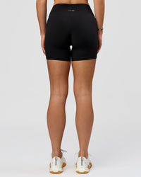 Woman wearing RXD Mid-Rise 6" Short - Black | Model:Amity | Size:S | Thumbnail Index: 6
