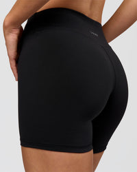 Woman wearing RXD Mid-Rise 6" Short - Black | Model:Amity | Size:S | Thumbnail Index: 2
