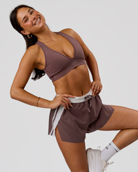Woman wearing Accelerate 3" Force High-Rise Running Short - Cocoa Powder | Model:Bianca | Size:S | Thumbnail Index: 7
