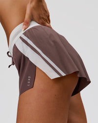 Woman wearing Accelerate 3" Force Mid-Rise Running Short - Cocoa Powder | Model:Bianca | Size:S | Thumbnail Index: 2