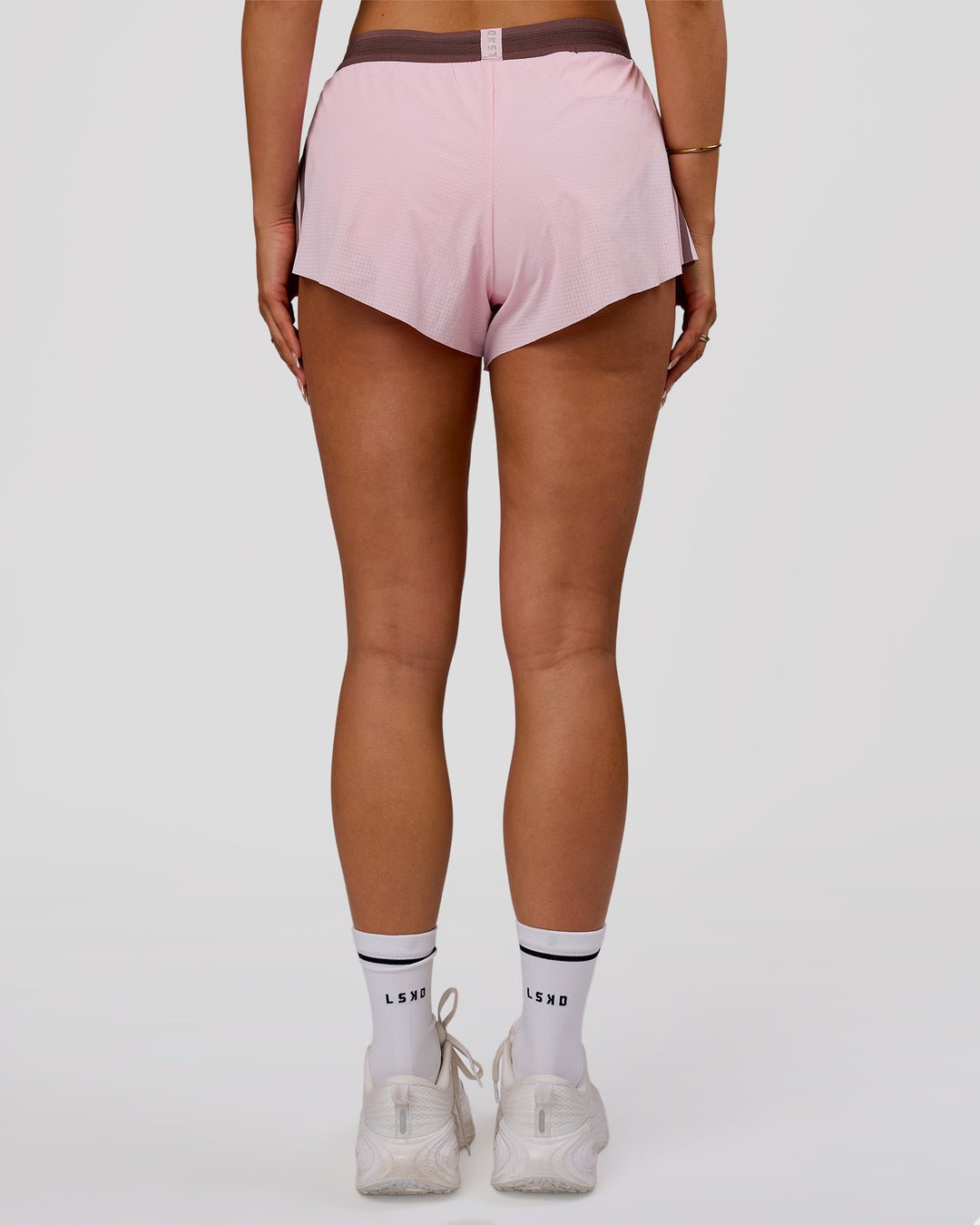 Woman wearing Accelerate 3" Force Mid-Rise Running Short - Marshmallow-Cocoa Powder | Model:Bianca | Size:S - view 10