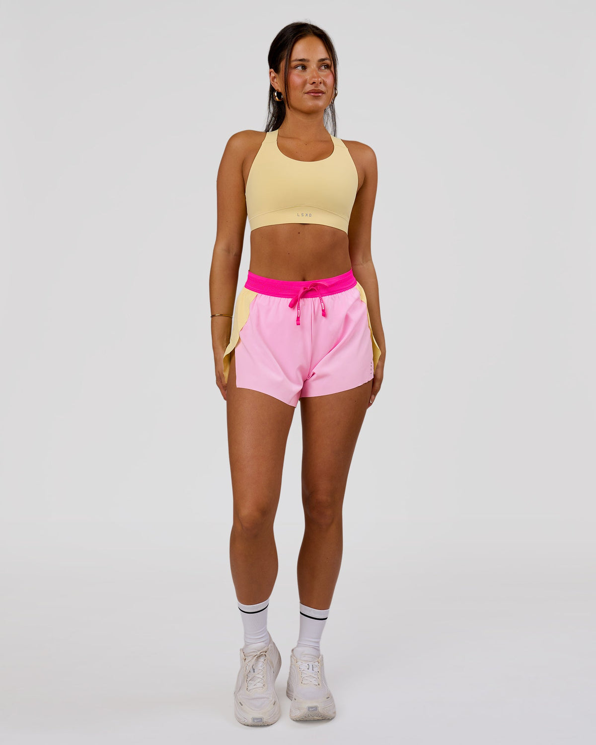 Woman wearing Accelerate 3" High-Rise Running Short - Marshmallow-Lemon-Ultra Pink | Model:Bianca | Size:S - view 2