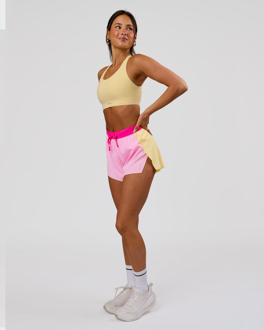 Woman wearing Accelerate 3" High-Rise Running Short - Marshmallow-Lemon-Ultra Pink | Model:Bianca | Size:S - view 5