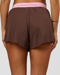 Woman wearing Accelerate 3" High-Rise Running Short - Neapolitan | Model:Bianca | Size:S | Thumbnail Index: 8