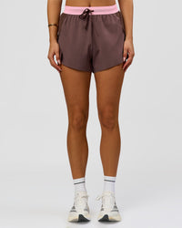 Woman wearing Accelerate 3" High-Rise Running Short - Neapolitan | Model:Bianca | Size:S | Thumbnail Index: 4