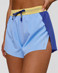 Woman wearing Accelerate 3" High-Rise Running Short - Power Cobalt-Open Air-Lemon | Model:Bianca | Size:S | Thumbnail Index: 0