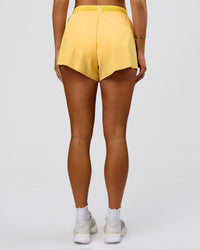 Woman wearing Accelerate 3" High-Rise Running Short - Sunbeam-Lemon | Model:Bianca | Size:S | Thumbnail Index: 11