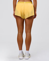 Woman wearing Accelerate 3" High-Rise Running Short - Sunbeam-Lemon | Model:Bianca | Size:S | Thumbnail Index: 12