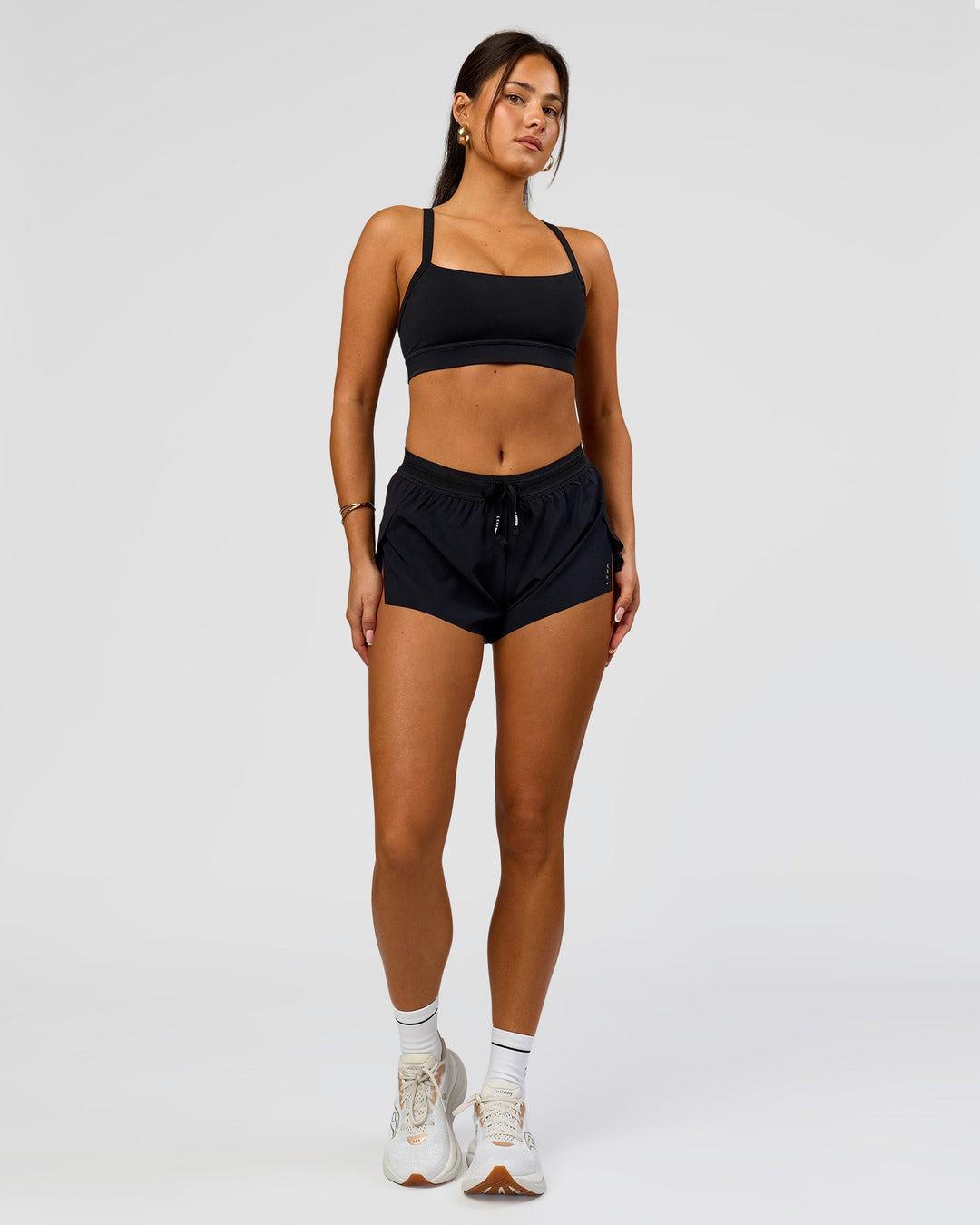 Woman wearing Accelerate 3" Mid-Rise Running Short - Black | Model:Bianca | Size:S