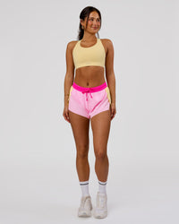 Woman wearing Accelerate 3" Mid-Rise Running Short - Marshmallow-Lemon-Ultra Pink | Model:Bianca | Size:S | Thumbnail Index: 1