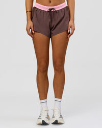 Woman wearing Accelerate 3" Mid-Rise Running Short - Neapolitan | Model:Bianca | Size:S | Thumbnail Index: 7