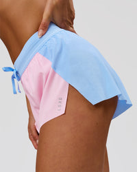 Woman wearing Accelerate 3" Mid-Rise Running Short - Open Air-Marshmallow | Model:Bianca | Size:S | Thumbnail Index: 5