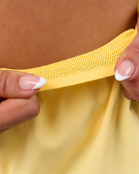 Woman wearing Accelerate 3" Mid-Rise Running Short - Sunbeam-Lemon | Model:Bianca | Size:S | Thumbnail Index: 13