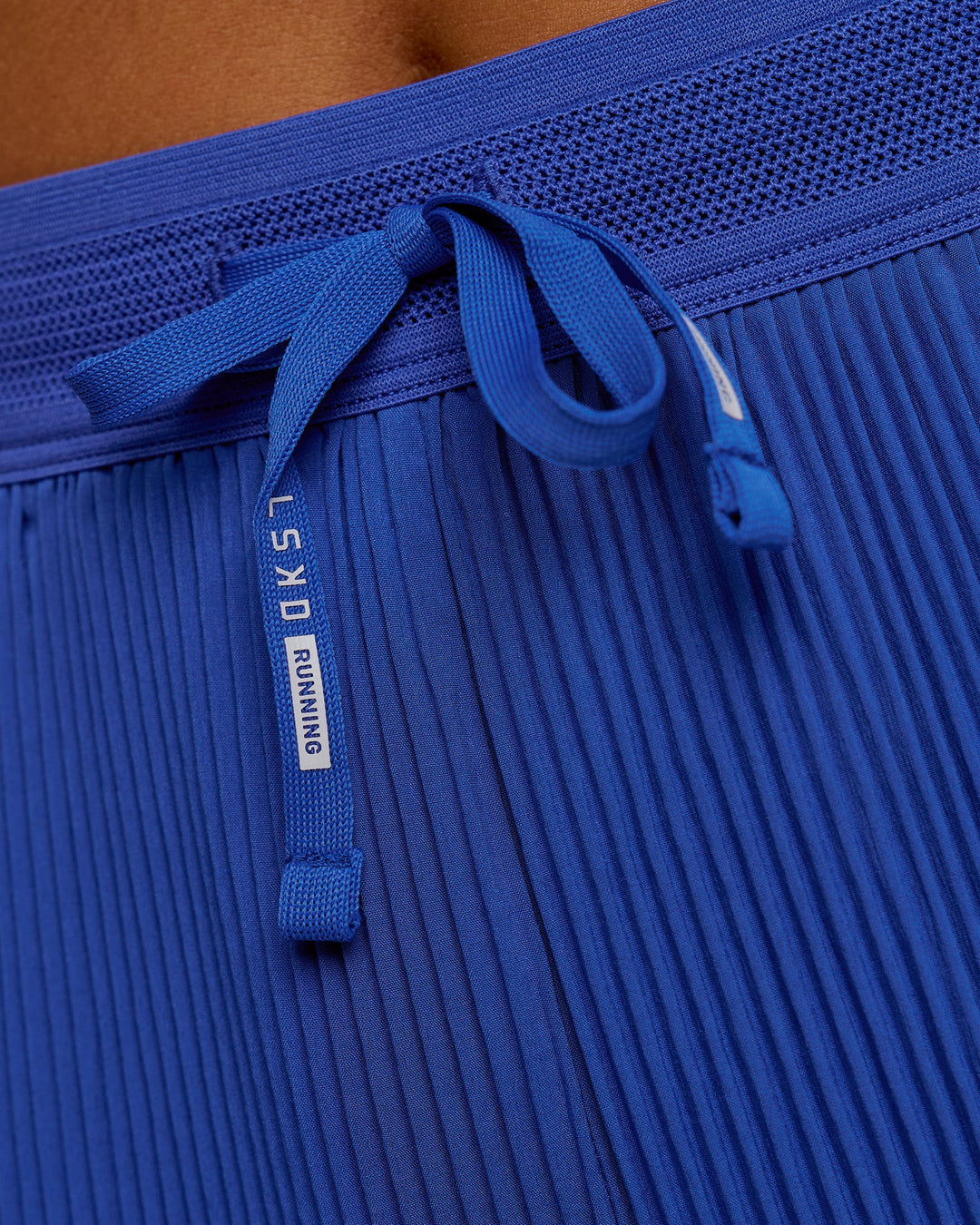 Woman wearing Accelerate 3" Pleated High-Rise Running Short - Power Cobalt | Model:Bianca | Size:S - view 9