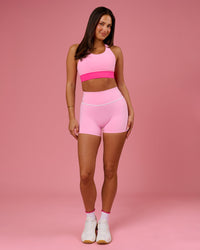 Woman wearing Accelerate Split Strap Sports Bra - Pink Rose-Ultra Pink | Model:Bianca | Size:S | Thumbnail Index: 5