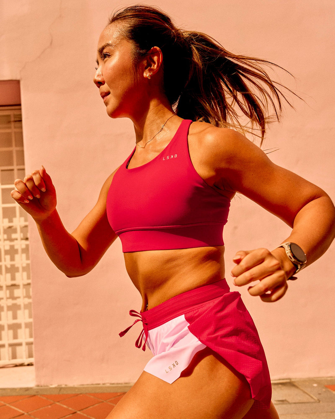 Woman wearing Accelerate Sports Bra - Scarlet | Model:Bianca | Size:S - view 7