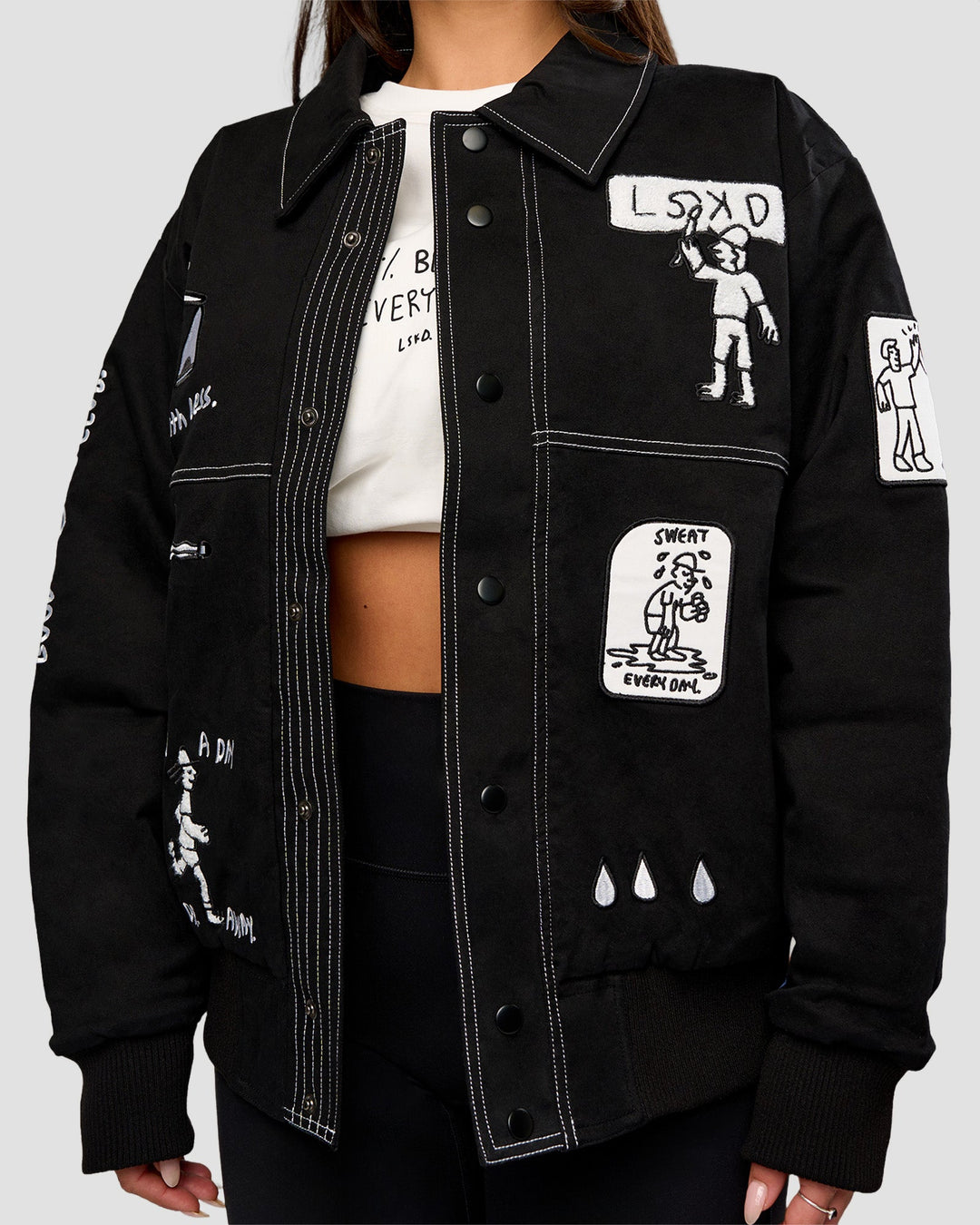 Woman wearing Andrew J. Steel x LSKD Bomber Jacket - Black | Model:Bianca | Size:S - view 3