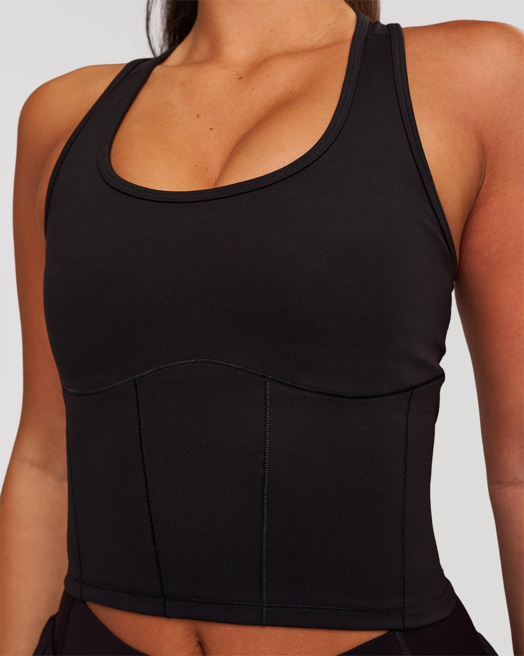 Woman wearing Aura Mesh Shelf Bra Tank - Black | Model:Bianca | Size:S - view 3