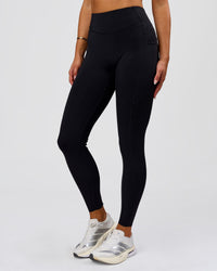 Woman wearing Elite Run High-Rise Full Length Legging Pockets - Black | Model:Bianca | Size:S | Thumbnail Index: 11