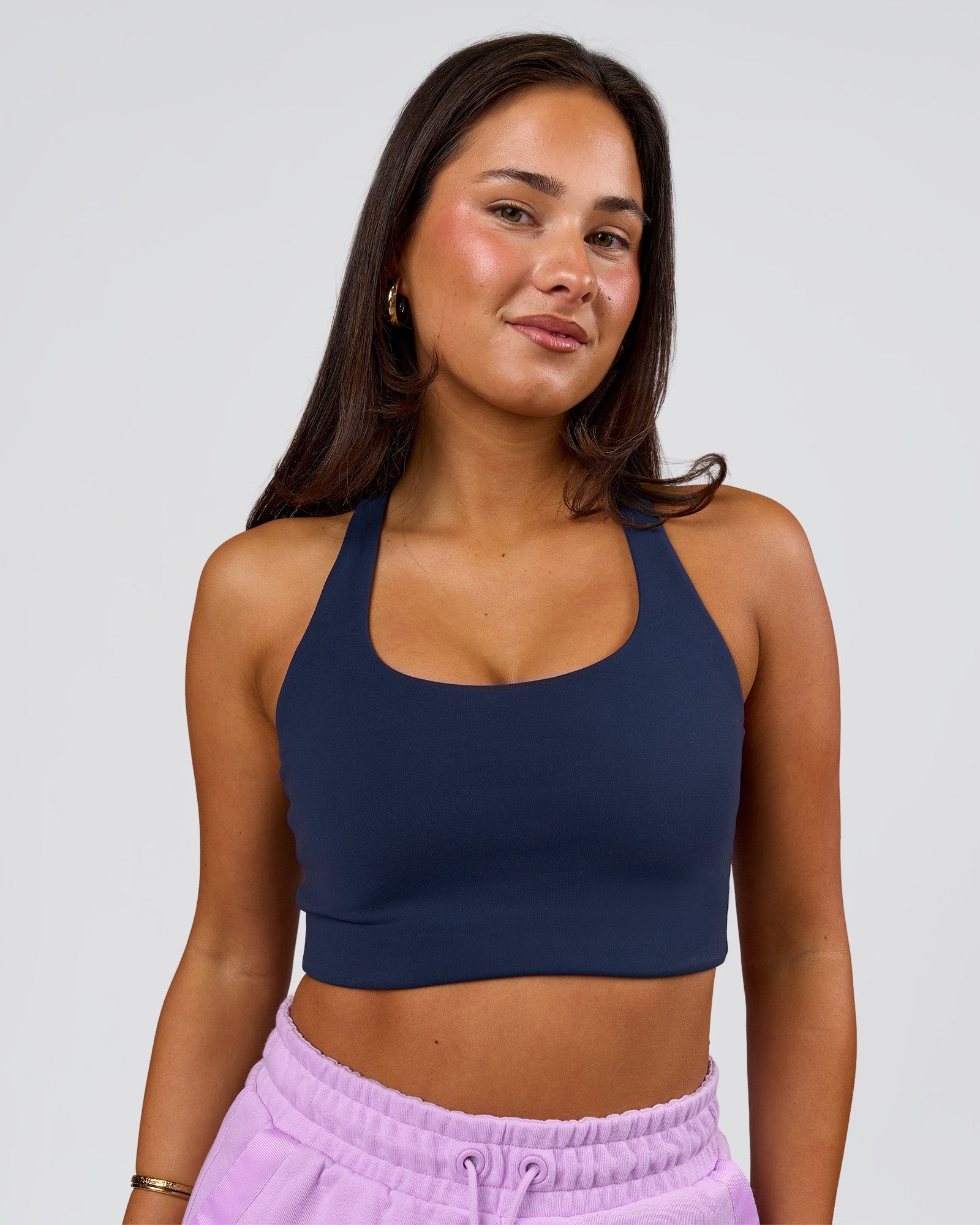Woman wearing Flow Long Line Sports Bra - Future Navy | Model:Bianca | Size:S