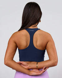 Woman wearing Flow Long Line Sports Bra - Future Navy | Model:Bianca | Size:S | Thumbnail Index: 3