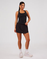 Woman wearing Flow Rep Scoop Neck Tank - Black | Model:Bianca | Size:S | Thumbnail Index: 5