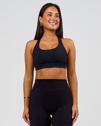 Woman wearing Flow Sports Bra - Black | Model:Bianca | Size:S | Thumbnail Index: 3