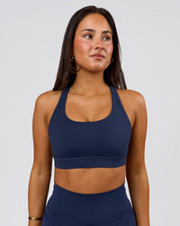 Woman wearing Flow Sports Bra - Future Navy | Model:Bianca | Size:S | Thumbnail Index: 0