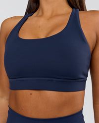 Woman wearing Flow Sports Bra - Future Navy | Model:Bianca | Size:S | Thumbnail Index: 4