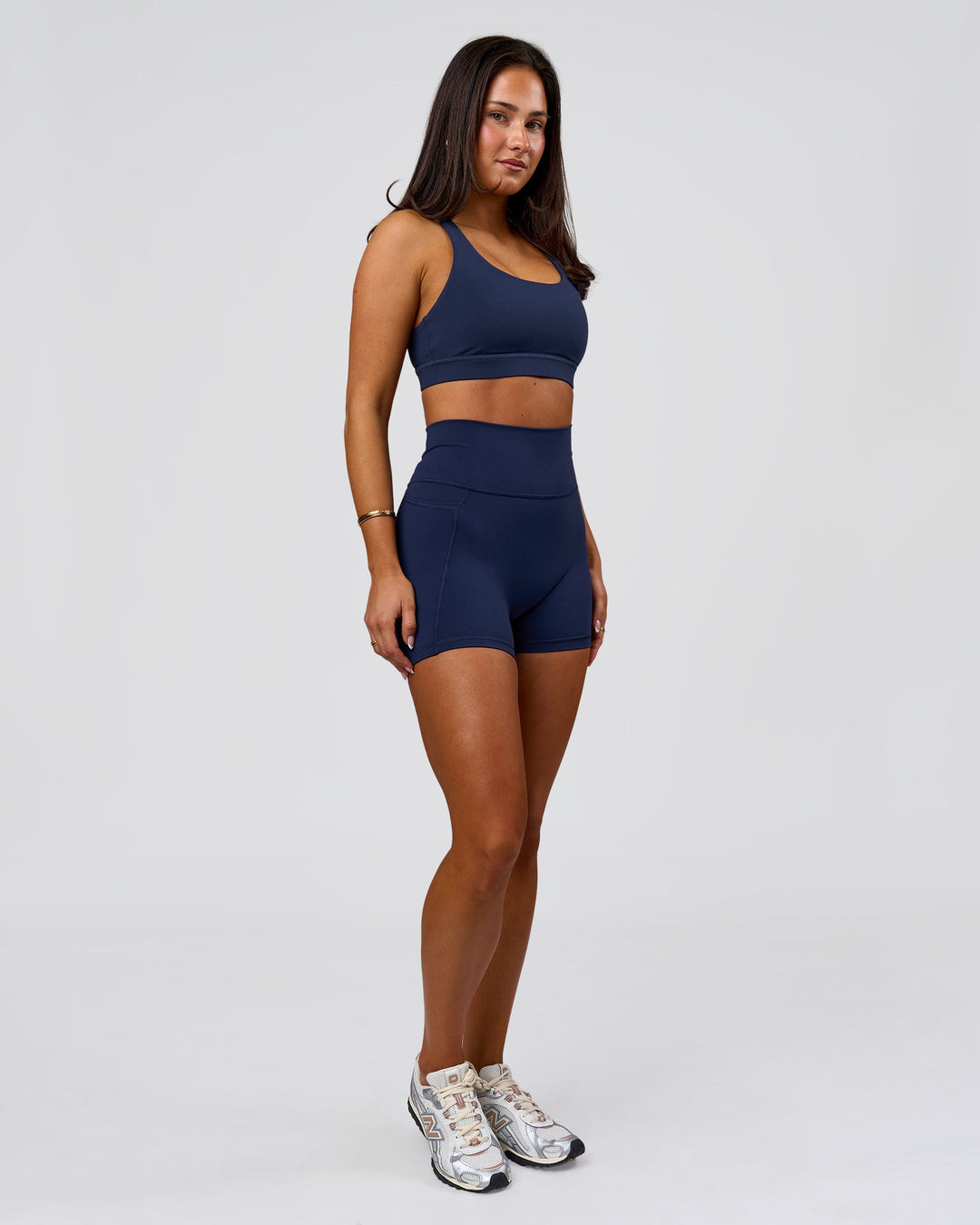 Woman wearing Flow Sports Bra - Future Navy | Model:Bianca | Size:S - view 6