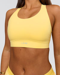 Woman wearing Fusion Sports Bra 2.0 - Lemon | Model:Bianca | Size:S | Thumbnail Index: 3